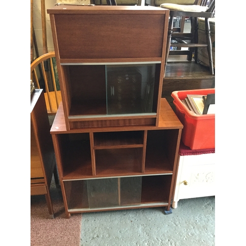 377 - A retro side cabinet,
with sliding door, together with two other side cabinets -