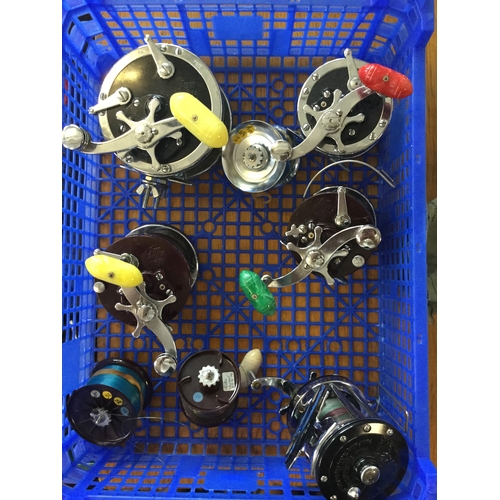 408 - Five Penn fishing reels,
including a Surfmaster and Senator, together with three spools -