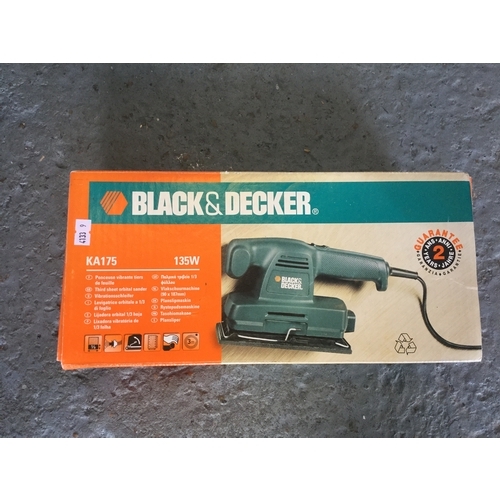 418 - A circular saw,
with 185mm blade and a Black & Decker sander -