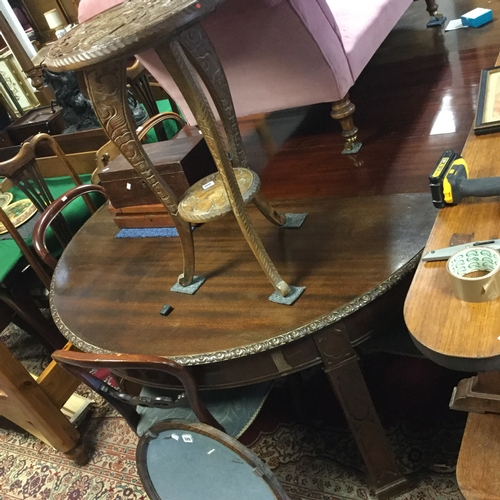 344 - A 19th century extending dining table,
in the Chinese Chippendale style, with moulded frieze and dec... 