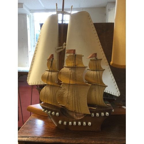 360 - A group of three table lamps,
including a brass galleon design -