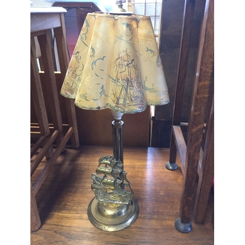 360 - A group of three table lamps,
including a brass galleon design -