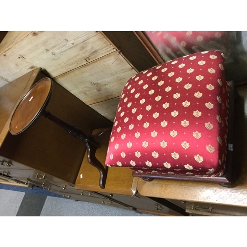 363 - A low footstool,
upholstered and on short legs, together with a reproduction wine table -