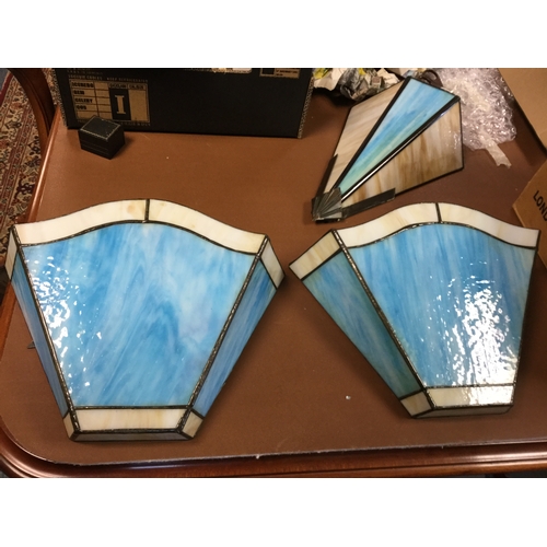 369 - A set of three coloured glass wall lights -