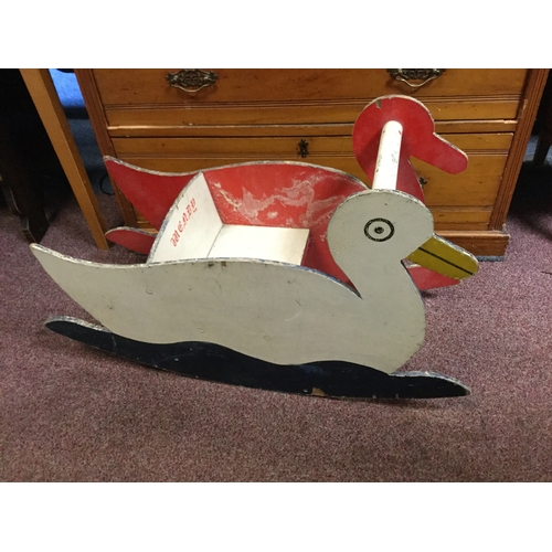 376 - A child's rocker,
the ends modelled as seagulls -