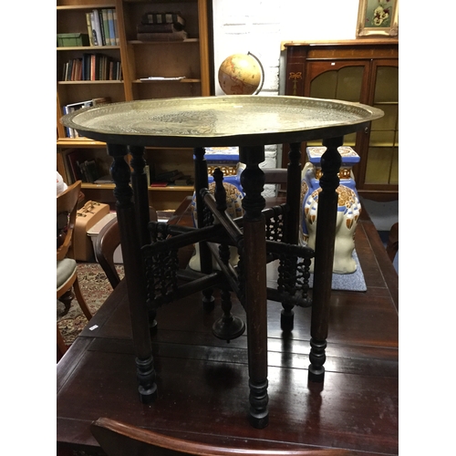 380 - A brass topped folding tiffin table -