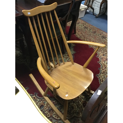 385 - An Ercol stick back rocking chair -