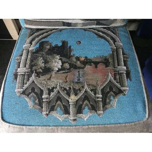 397 - A mid Victorian beadwork chair,
worked with a view of a ruined castle to the back, a moated castle s... 