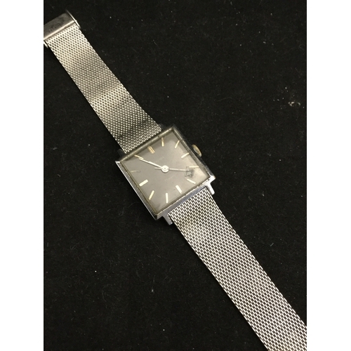 1 - A Sekonda 21 jewel wristwatch, 
with square dial, date aperture and steel mesh strap