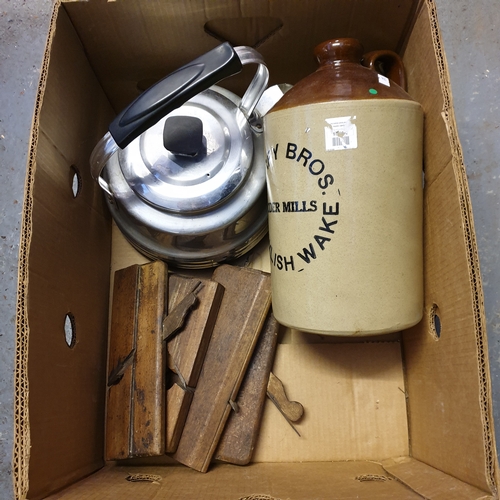 389 - A stoneware flagon, 
signed for Perry Bros., and a vintage kettle and four wood planes -