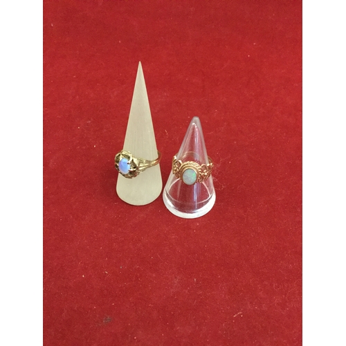 22 - An antique 9ct rose gold ring, 
set with an oval opal and another 9ct yellow gold example (2) -