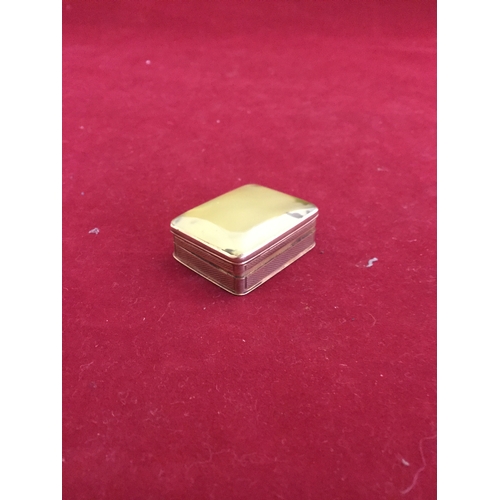 54 - A Georgian yellow metal vinaigrette, 
with lift top revealing a pierced grill, later suspension loop... 