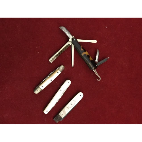 55 - A 19th century tortoiseshell mounted, 
pocket knife, with various blades, comb, ear scoop, etc., and... 