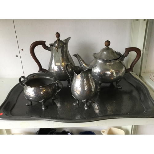 234 - A Tudric pewter tea service, on tray -