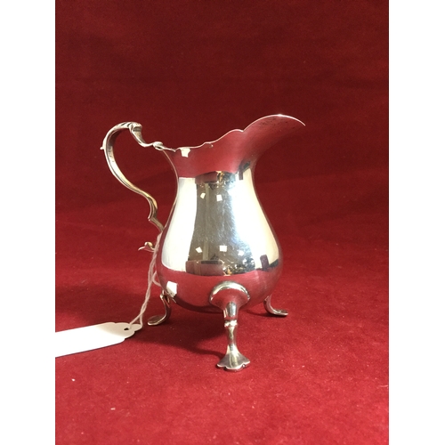 21 - A 20th century silver cream jug, Chester 1937, 
in the Georgian taste -