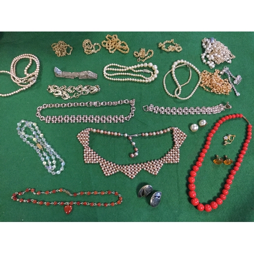 45 - A quantity of vintage costume jewellery, 
including some silver, coral beads etc -