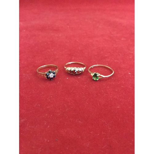 55 - Three 9ct gold rings, 
comprising a five stone garnet ring, a sapphire and diamond cluster and a gre... 