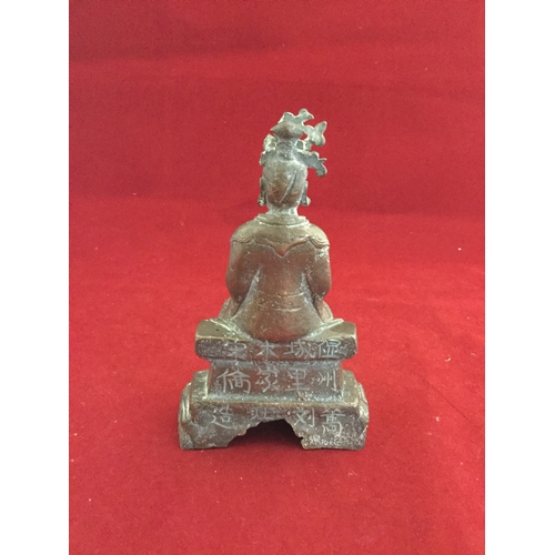 85 - A Chinese bronze of Mazu, or Lin Mo, 
the sea goddess, seated on a plinth, signature to reverse -