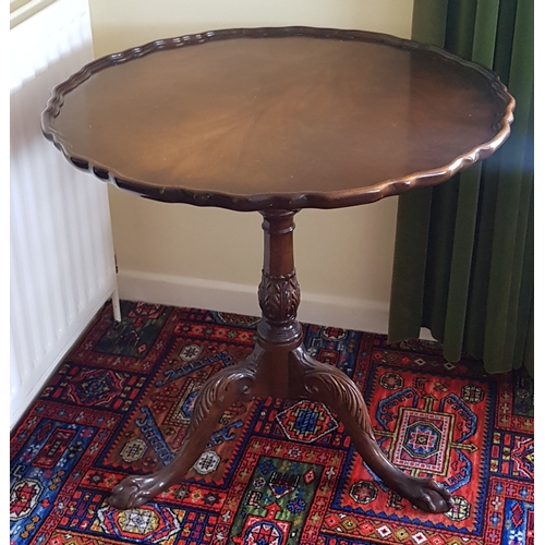 250 - A mahogany birdcage action table, 
with pie crust top, acanthus leaf column and three leaf capped le... 