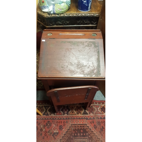 265 - A vintage school desk and matching chair -