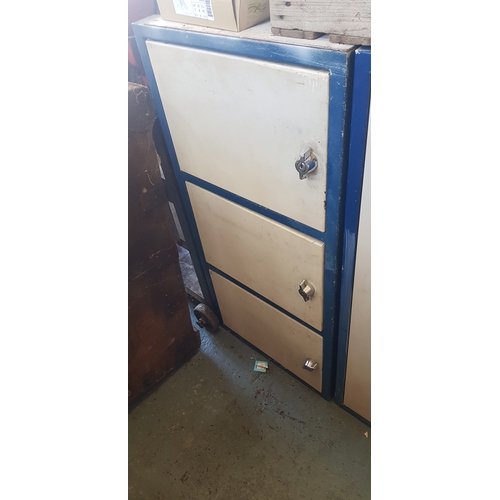 356 - An industrial steel cupboard/locker, 
with three doors -