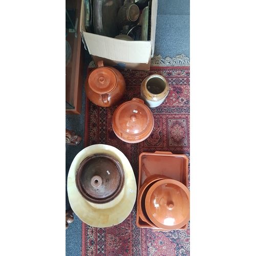 361 - A quantity of terracotta and stoneware cooking pots -