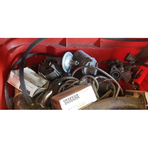 377 - A box of assorted car parts, 
to include carburettors, distributors etc -