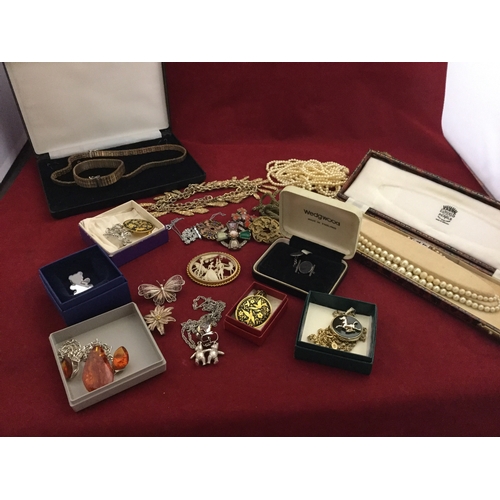 12 - A selection of costume jewellery, including silver and amber pendant on chain and matching ear-clips... 