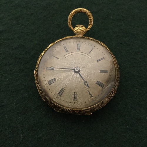 27 - A lady's pocket watch, open faced and with engine turned dial, the reverse with enamelled decoration... 