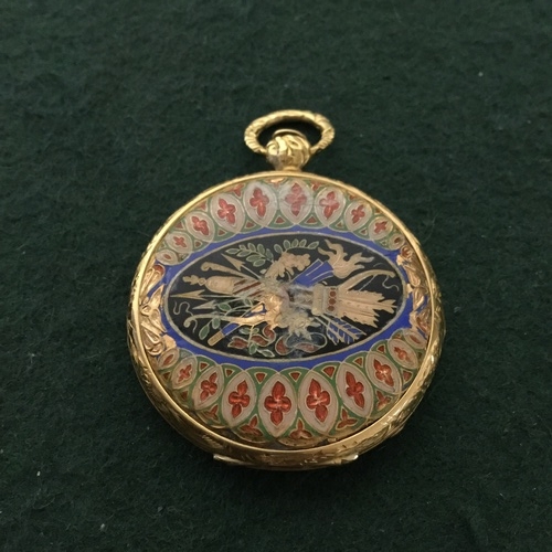 27 - A lady's pocket watch, open faced and with engine turned dial, the reverse with enamelled decoration... 