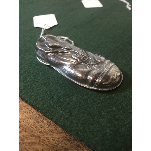 55 - A silver plated vesta, in the form of a boot -