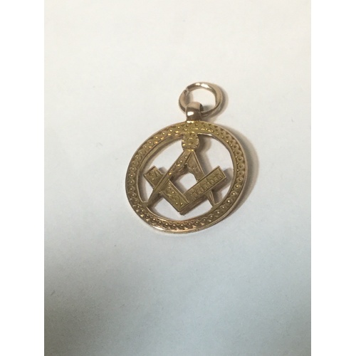 87 - A 15ct gold masonic charm/fob -