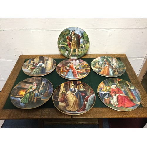 123 - A set of seven Royal Doulton limited edition plates, depicting Henry VIII and his six wives -