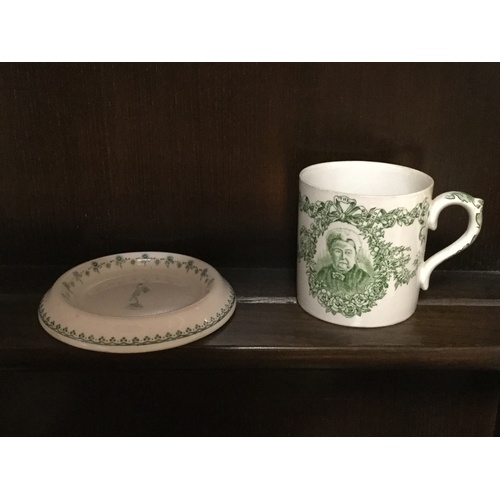 124 - A Doulton Burslem mug, commemorating Queen Victoria's diamond jubilee and a Royal Worcester 'Tolly' ... 