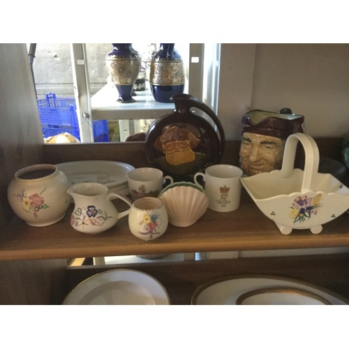 128 - A mixed lot of china, to include Poole Pottery -