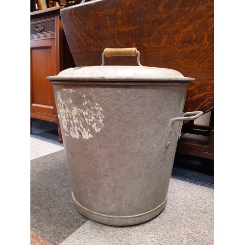 418 - A galvanised bin and cover -