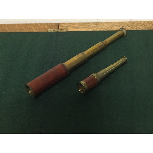 222 - A four drawer pocket telescope and another similar (2) -