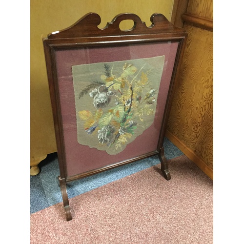 321 - A mahogany framed firescreen, inset with needlework and beadwork panel -