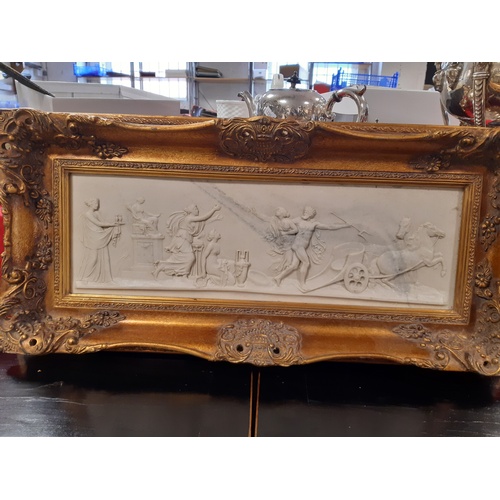 201 - A modern relief of a neo-classical scene, in gilt frame -