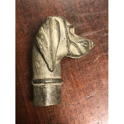 297 - A walking cane handle, cast a dog's head -