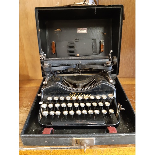 304 - A French 'Bijou' travelling typewriter -