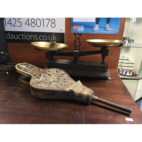 306 - A mixed lot, to include French scales, pewter measures, copper pan and bellows -