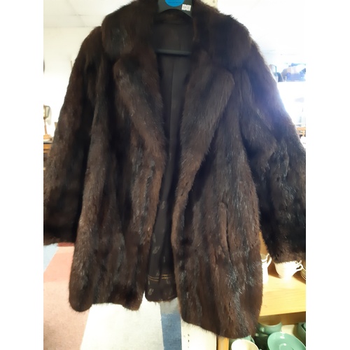 311 - Two fur coats -