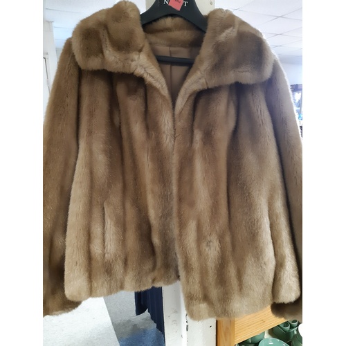 311 - Two fur coats -