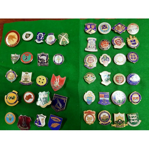 317 - A collection of English enamelled bowls badges, and others from Botswana, Kenya, Malawi and Zambia -