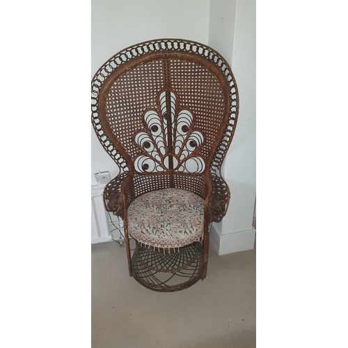 334 - A canework 'peacock' chair -