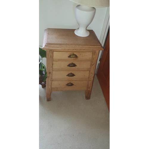 343 - A pine chest of tapering form, fitted with four graduated drawers -