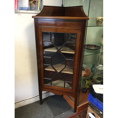 345 - An Edwardian mahogany and inlaid corner display cabinet, with single glazed door enclosing lined she... 