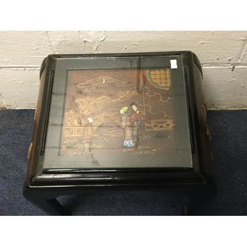 364 - A Chinese lacquered hardwood occasional table, with figural decoration -