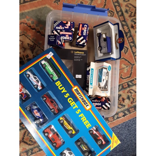 235 - A quantity of die cast model cars, vans etc -